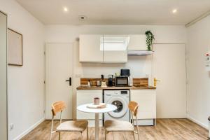 Appartements La Suite Sable - Cosy studio - Proche Metro B : photos des chambres