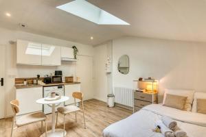 Appartements La Suite Sable - Cosy studio - Proche Metro B : photos des chambres