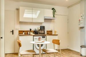 Appartements La Suite Sable - Cosy studio - Proche Metro B : photos des chambres