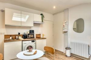 Appartements La Suite Sable - Cosy studio - Proche Metro B : photos des chambres