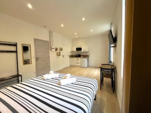Appartements Cosy & Chic- Hyper Centre AGEN : photos des chambres