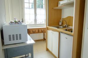 Maison Studios & Appartements Les 4 Vents : photos des chambres