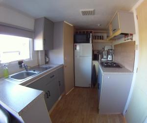 Chalet met 2 slaapkamers op gezellige camping met zwembad nabij Ijsselmeer