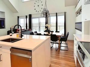 Forest Chalet with Hot Tub & Lake Views near Mont Saint-Sauveur