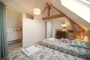 Maisons de vacances Les Jardins de Felicie : photos des chambres