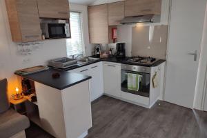 Maisons de vacances Comfortable 2-bedroom mobile home : photos des chambres