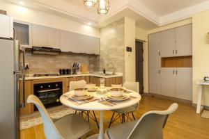 Elegant cozy two bedroom apartment with heated swimming pool well equipped gym ample parking space, children playing ground and amazing city views