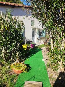 Maisons de vacances Une petite maison dans un quartier calme dans la zone verte proximite tous commerces : photos des chambres