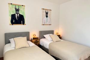 Maisons de vacances Les Lauriers Blancs air-conditioned villa with swimming pool : photos des chambres