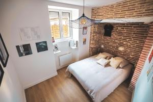 Appartements L-Heritage Agenais Coeur du centre ville : photos des chambres