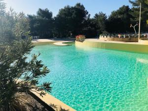 Appartements SUNRISE - Golf de Pont Royal : photos des chambres