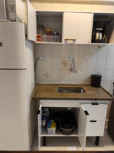 PÉ na Areia, em Frente a Praia Atravessar a Rua