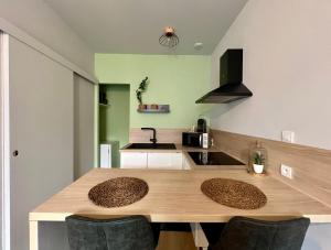Appartements PETIT CAPUCIN : photos des chambres