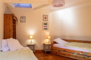 Villas Maison Atypique en centre bourg de Matignon : photos des chambres