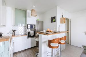 Appartements L-Eden - City Center - DISNEY 8 min, PARIS 28 min - GARE 1 min - PARKING - Free WIFI : photos des chambres