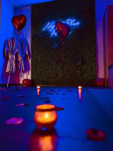 Escapade Romantique Jacuzzi & Sauna Privés