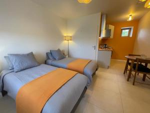 Appartements Gite Les Pieces du Moulin : photos des chambres