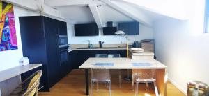 Appartement dans maison contemporaine