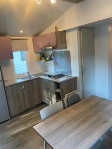 Campings Mobil-home 3 chambres, Plage & piscine, camping 4 etoiles : photos des chambres