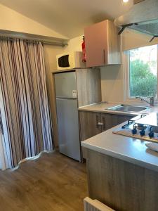 Campings Mobil-home 3 chambres, Plage & piscine, camping 4 etoiles : photos des chambres