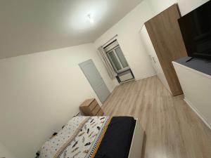 Appartements Studio cosy : photos des chambres