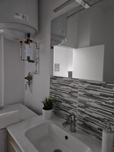 Appartements ANCIEN Fenetre sur cour : photos des chambres