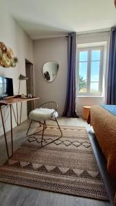 Maisons d'hotes La Cour Des Sens : photos des chambres