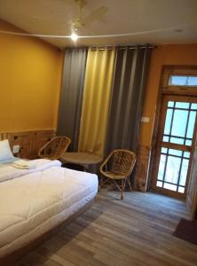 The Himalayan Walnut House - Tirthan