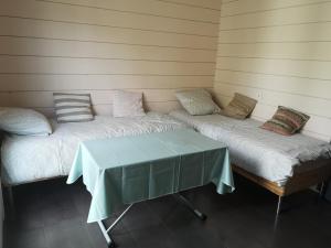 Maisons de vacances Maison en bois atypique : photos des chambres