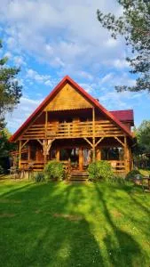 Drewniany dom z kominkiem, trasą S7 w 2h z Warszawy i Gdanska nad jezioro Mielno - Jadamowo