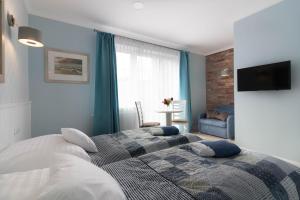 Pokoje Kopernika 4 by Zilla