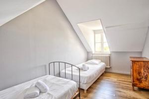 Maisons de vacances Villa 1880 - Centre Ville - Jardin Botanique : photos des chambres