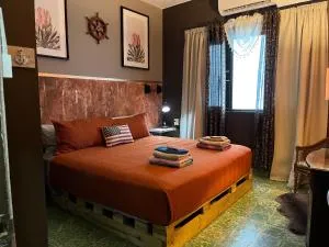 Coqui del Mar LGBTQ clothing optional guesthouse - San Juan