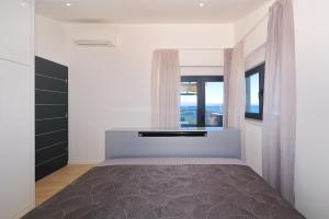 Apartments by the sea Kali, Ugljan - 24314