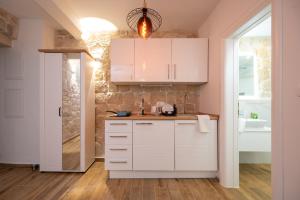 Apartments by the sea Trogir - 24338