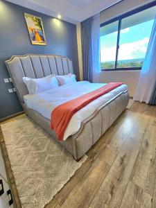 Beautifully and Elegantly furnished two bedroom with heated swimming pool fully equipped gym ample parking and children playing ground and a relaxing rooftop with an amazing scenic city views