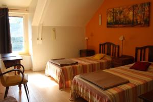 Maisons de vacances Le Clos de Penguily Broceliande 16 couchages SPA : photos des chambres