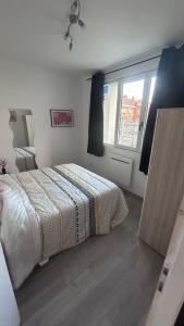 Appartements T3 Cosy situe au centre-ville : photos des chambres