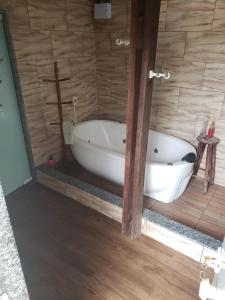 SUITE PRIVATIVA Piscina,churrasqueira,banheira e ar condicionado