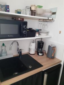 Appartements Studio independant chez l-habitant : photos des chambres