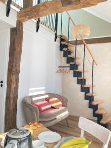 Appartements Le petit Grenier de la Fontaine : photos des chambres