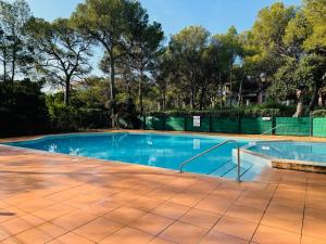 Studio climatisé avec piscine et parking privé