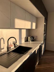 Appartements Appartement moderne avec deux chambres et parking : photos des chambres