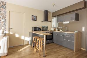 Appartements L echappee dina rdaise : photos des chambres
