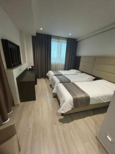 Chambre Triple Deluxe