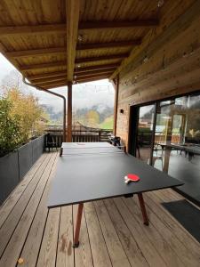 Chalets Chalet mitoyen - Jacuzzi - Cousinade I : photos des chambres