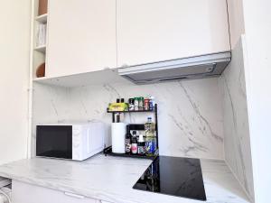 Appartements Adrien & Minmin-s cozy home, 15 minutes to Paris : photos des chambres