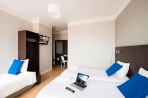 Hotels Hotel Atrium Mondial : photos des chambres