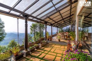 Under The Stars by StayVista - 3BHK Mountain-View Cottage with Bar