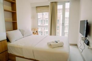 Relaxing Designed Studio at Tokyo Riverside PIK 2 Apartment By Travelio